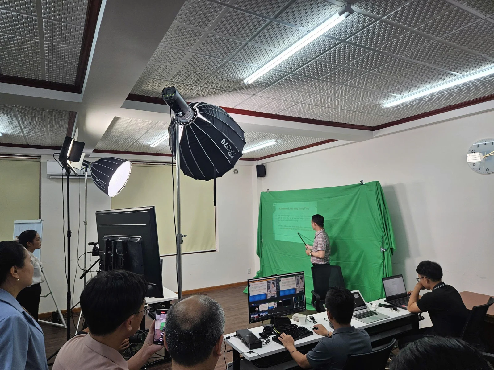 The team recording lessons in the studio